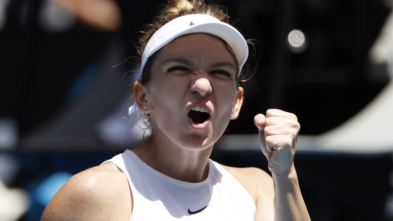 Romania's Simona Halep celebrates after defeating Belgium's Elise Mertens. Photo: AP Photo/Andy Wong