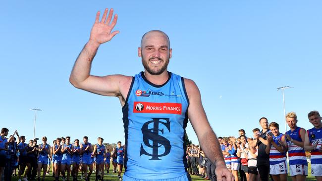 Dual Magarey Medallist &amp; premiership captain Zane Kirkwood walks from the ground after his final SANFL game. Picture: Kelly Barnes