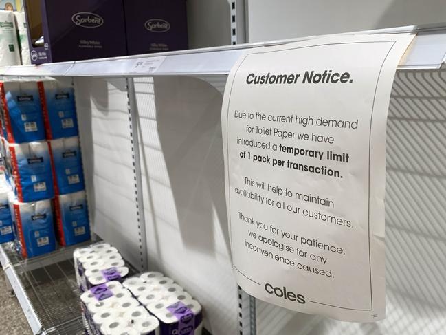 A supply issue sign in the toilet paper section of the Coles in St Kilda. Picture: Aaron Francis