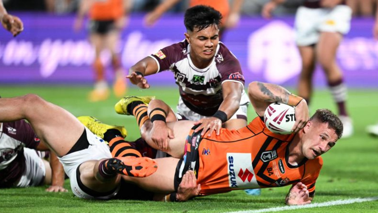 Tristan Powell scores a try for the Brisbane Tigers in the Hostplus Cup grand final. Photo: QRL