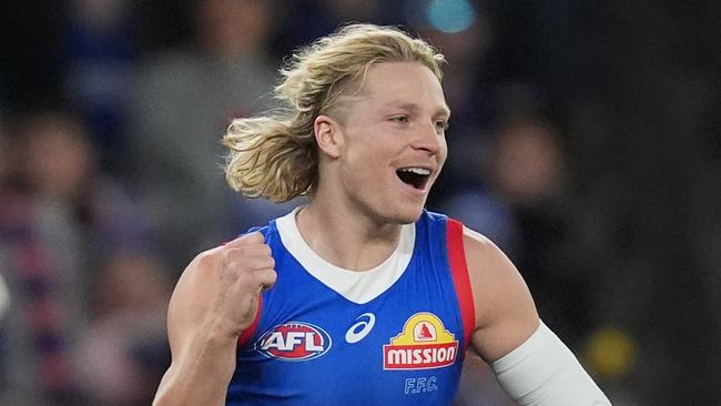 MELBOURNE, AUSTRALIA - JUNE 15: Cody Weightman of the Bulldogs celebrates kicking a goal during the round 14 AFL match between Western Bulldogs and Fremantle Dockers at Marvel Stadium, on June 15, 2024, in Melbourne, Australia. (Photo by Daniel Pockett/Getty Images)