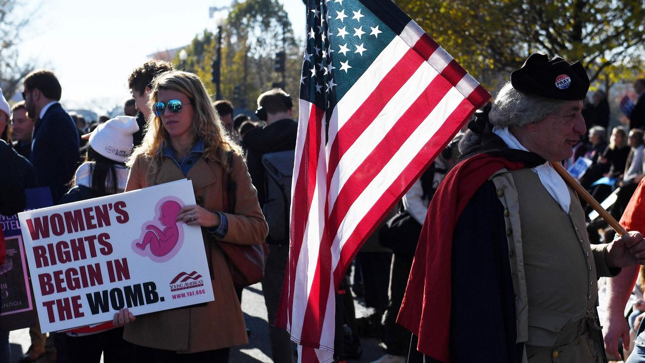Abortion rights advocates and anti-abortion protesters demonstrate in front of the US Supreme Court in Washington, DC. (Photo by OLIVIER DOULIERY / AFP)