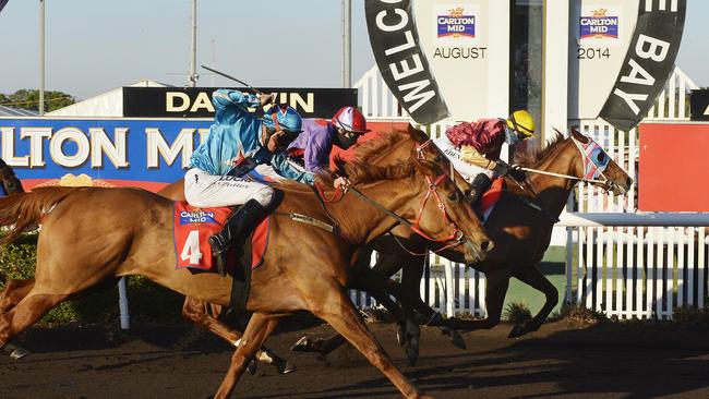 Action from the Carlton Mid Darwin Cup Day - 5:40pm. Winning horse Saturday Sorcerer ridden by winning jockey Paul Denton.