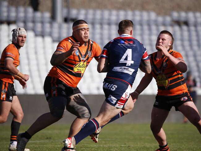 Jack Miller charges into Kohan Lewis. Picture Warren Gannon Photography