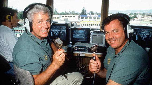 Former Formula One (F1) world champion driver Alan Jones (R) with sports commentator Darrell Eastlakes in commentary box overlooking the Albert Park circuit in Melbourne, Victoria. Jones and Eastlake are two of five Channel Nine commentators covering the 10/03/1996 Australian Formula One Grand Prix.