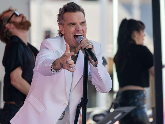 Thousands packed Fed Square to watch Robbie Williams perform in early January. Picture: Jason Edwards