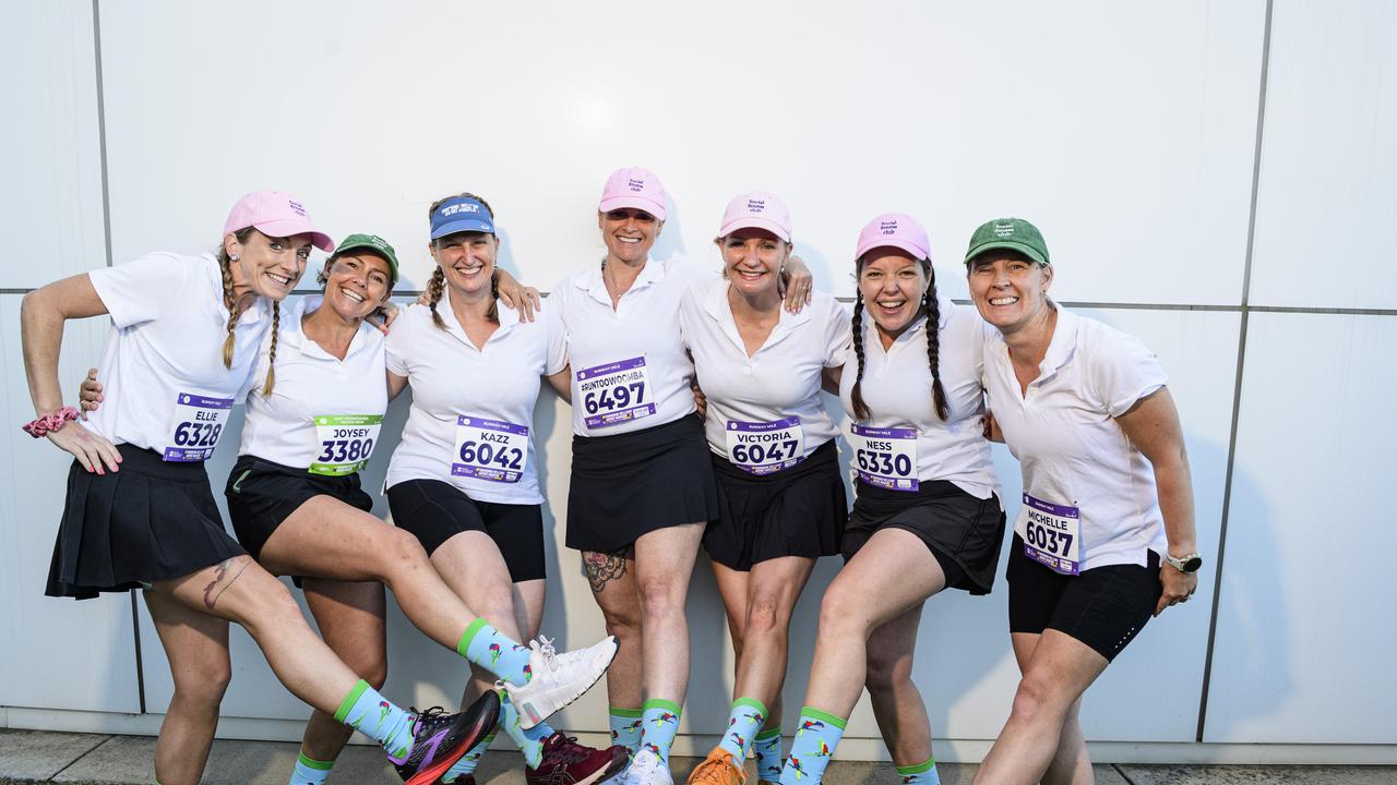 Team Social Fitness Club (from left) Elisa Denyer, Joy Owen-Jones, Karen McNamara, Sarah Leuenberger, Victoria Laird, Vanessa Gibson and Michelle Gilbert are ready for the dress-up Runway Mile of Toowoomba Marathon events at Wellcamp Airport, Saturday, May 3, 2025. Picture: Kevin Farmer