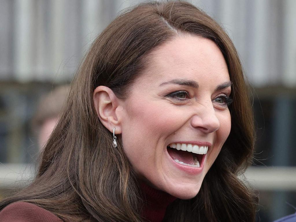 Britain's Catherine, Princess of Wales (L) reacts as she is reunited with an old school teacher of hers following the tour of the National Maritime Museum Cornwall on February 9, 2023 in Falmouth, England. (Photo by Chris Jackson / POOL / AFP)