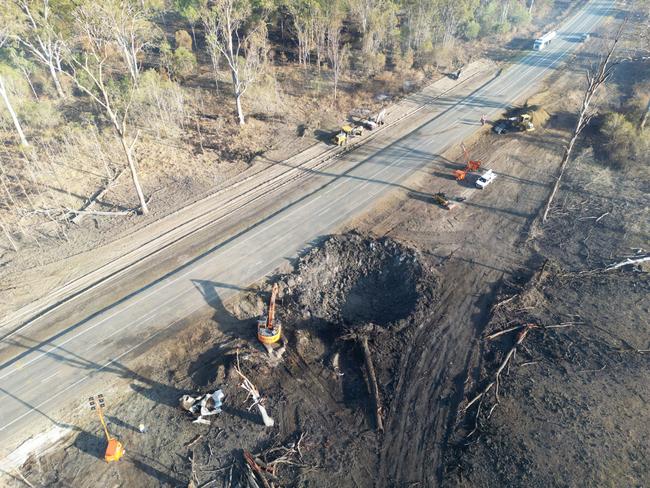 Recovery works on the Bruce Highway where an ammonium nitrate truck exploded near Bororen. Photo – TMR