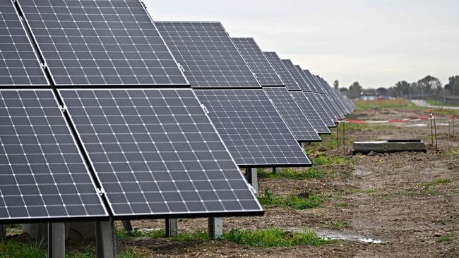 A picture shows photovoltaic panels at the new Solar Farm, located along the runway of Rome Fiumicino airport, during the inauguration by Aeroporti di Roma (ADR), in Fiumicino on January 20, 2025. (Photo by Andreas SOLARO / AFP)