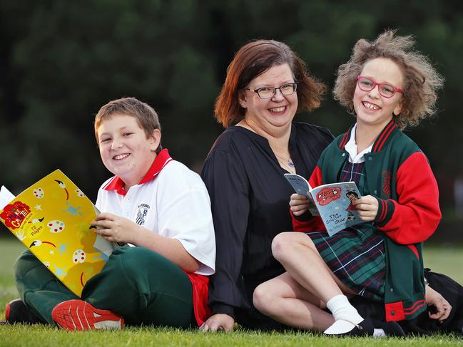 Deborah Flamm, with children Jonathan and Michaela, says the register will give parents extra peace of mind. Picture: Sam Ruttyn