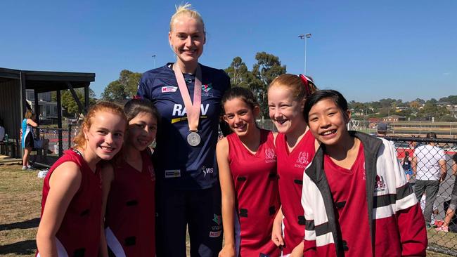 Jo Weston meets fans at a local junior netball tournament