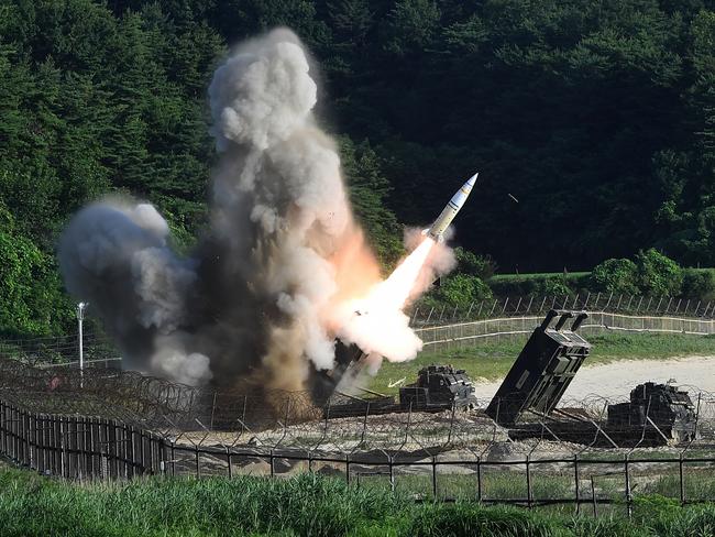 The US M270 Multiple Launch Rocket System fires an MGM-140 Army Tactical Missile during a US and South Korea joint missile drill. Picture: South Korean Defence Ministry via Getty Images