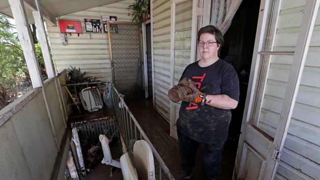 The Northern Star journalist Cath Piltz had to be evacuated from her South Lismore home and has recently returned to find the record flood waters ruined everything in her house, including her camera equipment. Picture: Toby Zerna