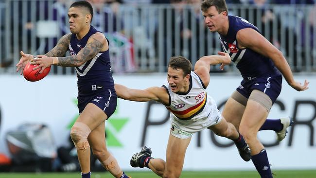 Tom Doedee at full strength tackles Michael Walters of the Dockers on Sunday. Picture: Paul Kane/Getty Images