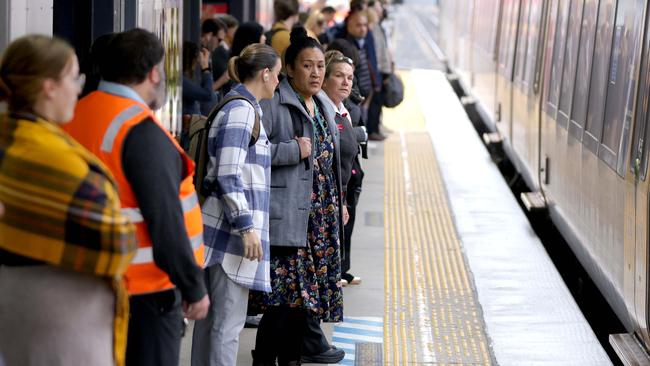 50c fares started today, people are waiting on the platform, Queensland Rail, Beenleigh Station, Monday 5th August - Photo Steve Pohlner