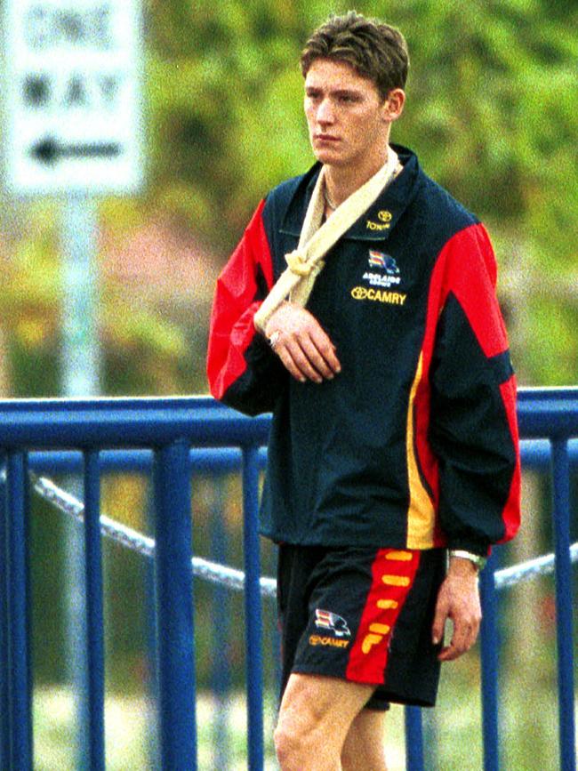 Footballer Laurence Angwin with injured shoulder at Adelaide Crows training session. injury