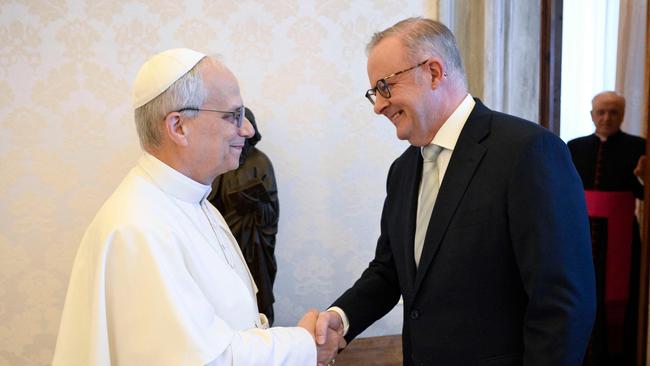 This photo taken and handout on May 19, 2025 by The Vatican Media shows Pope Leo XIV during an audience with the Prime Minister of Australia Anthony Albanese, in The Vatican. (Photo by Handout / VATICAN MEDIA / AFP) / RESTRICTED TO EDITORIAL USE - MANDATORY CREDIT 