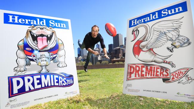 Herald Sun Cartoonist Mark Knight with his annual premiership posters. Picture: Alex Coppel