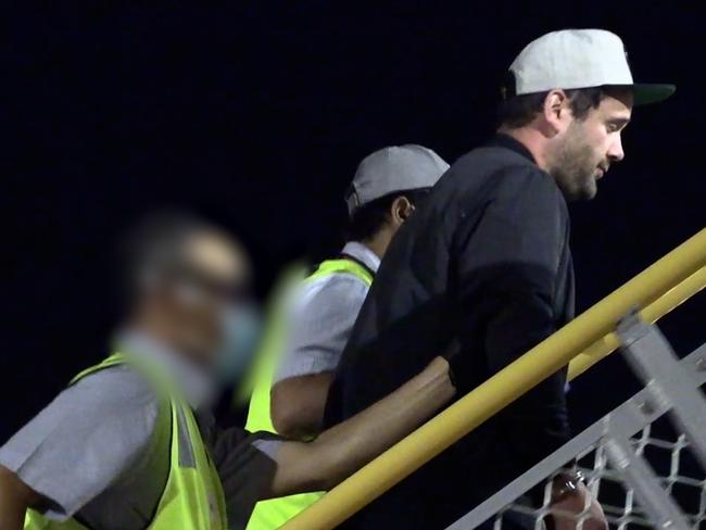 One of the men boards the chartered plane back to New Zealand. Picture: ABF