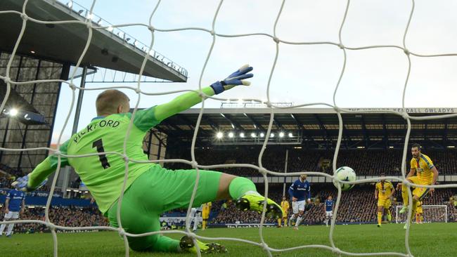 Everton goalkeeper Jordan Pickford sticks out a leg to save a penalty from Crystal Palace’s Luka Milivojevic. Picture: AFP