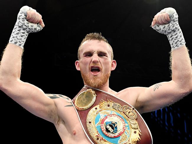 Brisbane’s Dennis Hogan celebrates beating Jamie Weetch in December. Picture: Getty Images