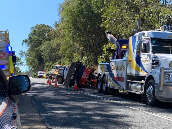 An excavator landed on the front of a Ute on the Mary valley Highway this morning. Photos: Maddie Manwaring