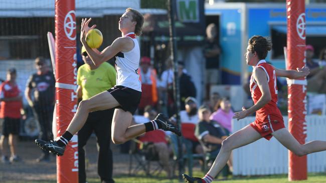 BITS Saints' Adam Hull takes a mark in the grand final against Yeppoon. Photo: Jann Houley