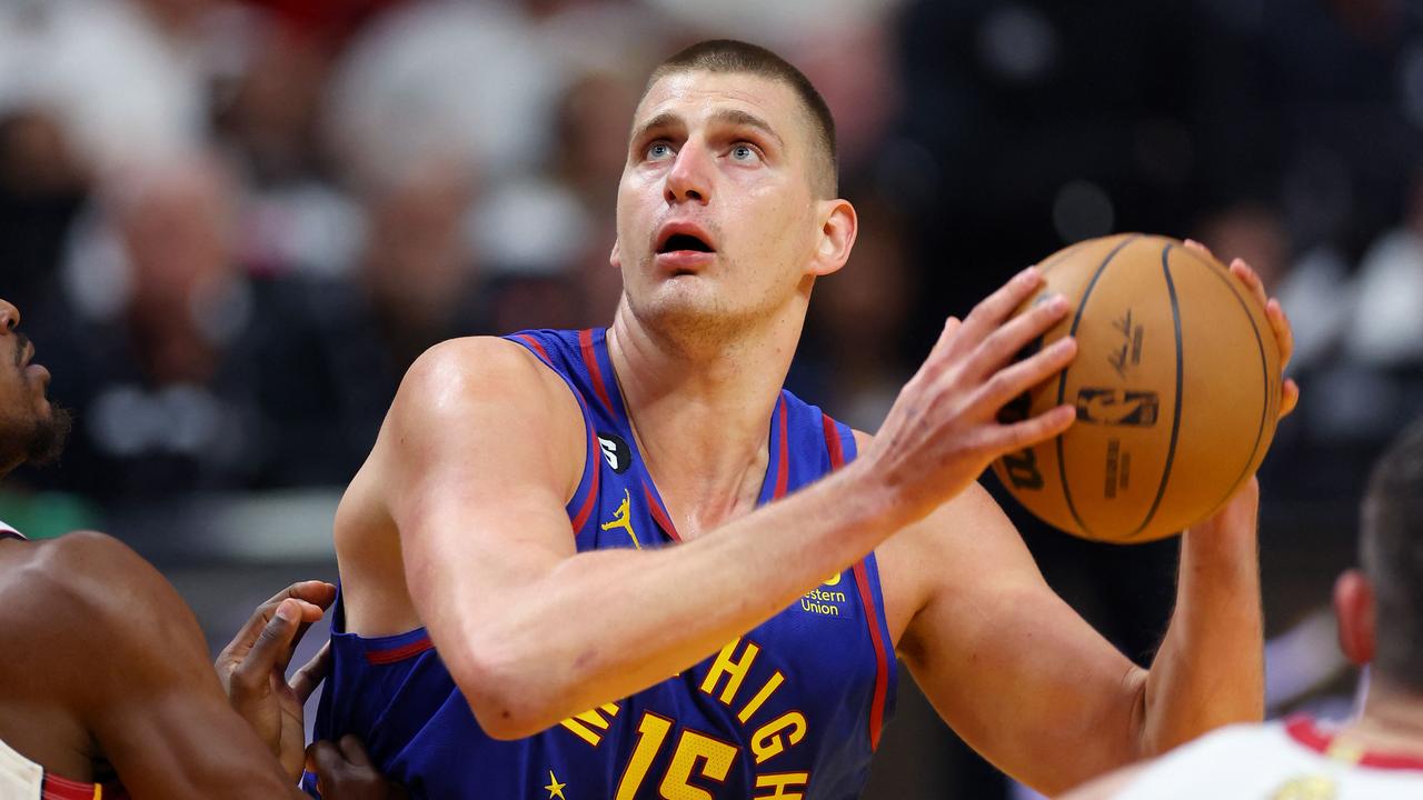 MIAMI, FLORIDA - JUNE 07: Nikola Jokic #15 of the Denver Nuggets drives the lane during the first quarter against the Miami Heat in Game Three of the 2023 NBA Finals at Kaseya Center on June 07, 2023 in Miami, Florida. NOTE TO USER: User expressly acknowledges and agrees that, by downloading and or using this photograph, User is consenting to the terms and conditions of the Getty Images License Agreement. Mike Ehrmann/Getty Images/AFP (Photo by Mike Ehrmann / GETTY IMAGES NORTH AMERICA / Getty Images via AFP)