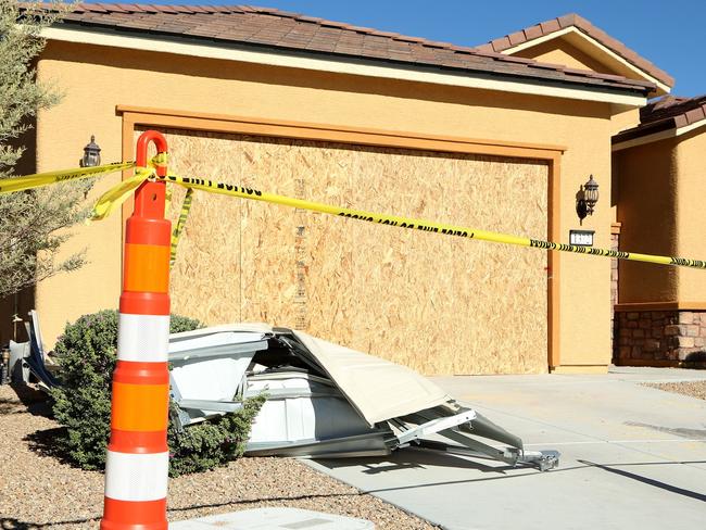 Remains of the garage door sit in the driveway in front Paddock’s house. Picture: Gabe Ginsberg/Getty Images/AFP