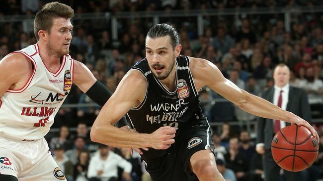 Melbourne United’s Chris Goulding drives on Illawarra’s Rotnei Clarke