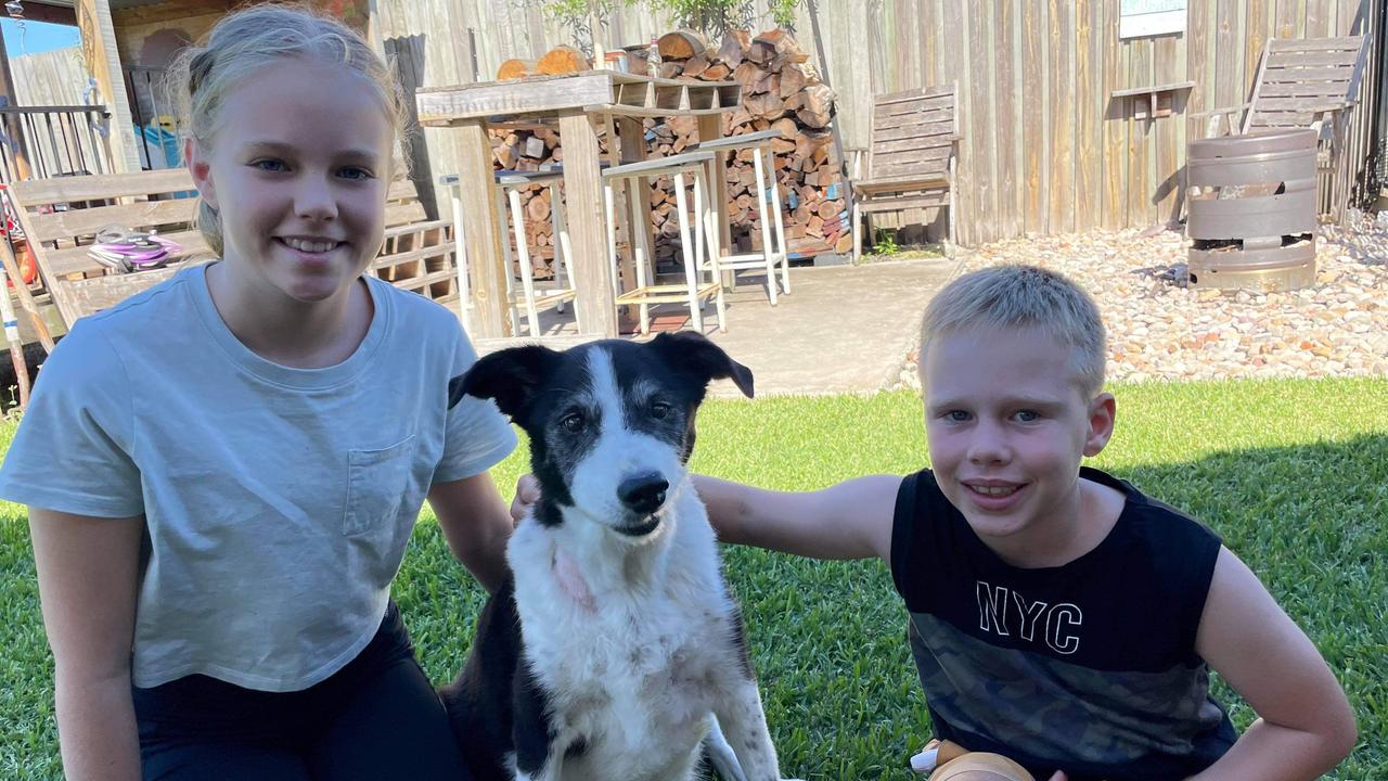 Lily and Thomas White with their beloved dog, Sasha.