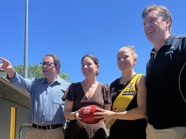 Solomon MP Luke Gosling, AFL NT Facilities and Government Partnerships Manager NT Katrina Kawaljenko, Nightcliff Tigers player Hayley Jones and Councillor Ed Smelt at Nightcliff Oval.