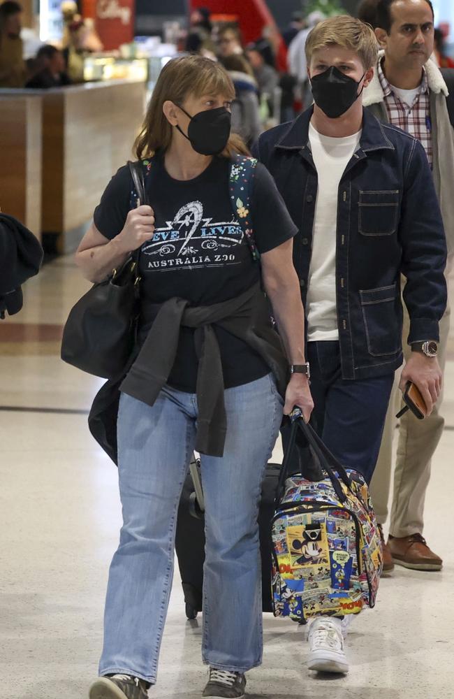 Irwin and Charlotte Briggs were seen arriving at Sydney Airport together with Irwin’s mother. Picture: Media Mode.