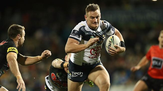 BATHURST, AUSTRALIA — MAY 04: Coen Hess of the Cowboys makes a break during the round nine AFL match between the Penrith Panthers and the North Queensland Cowboys at Carrington Park on May 4, 2018 in Bathurst, Australia. (Photo by Mark Metcalfe/Getty Images)