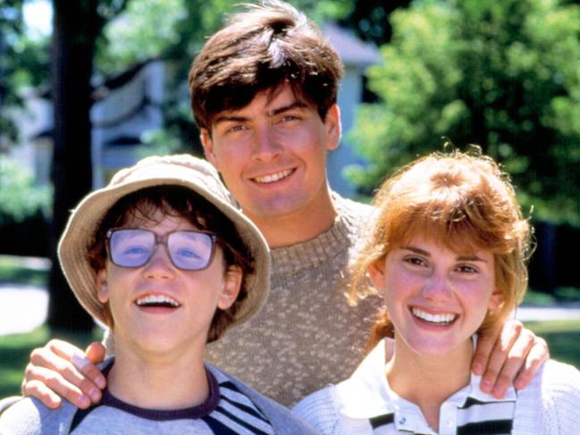 Corey Haim with Charlie Sheen and Kerri Green on the set of Lucas in 1986.