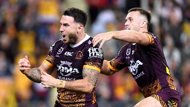 Darius Boyd celebrates a try with Jake Turpin. Picture: Bradley Kanaris/Getty Images