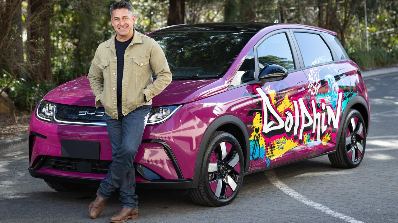 BYD brand ambassador Jamie Durie with the new Dolphin electric car. Picture: Julian Andrews