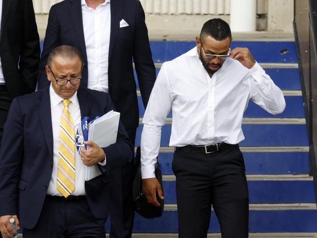 Addo-Carr leaving Belmore Sports Ground with his lawyer Elias Tabchouri after a meeting with the Bulldogs board before his sacking. Picture: Jonathan Ng