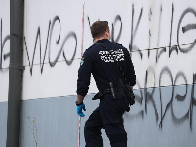 SYDNEY, AUSTRALIA : NewsWire Photos - JANUARY 30 2025; Police and forensics are at the back of Mount Sinai College in the carpark in Maroubra as new anti-semitic graffiti plastered on property at in Sydney continues to suffer a spate of anti semitic attacks. Picture: NewsWire/ Gaye Gerard