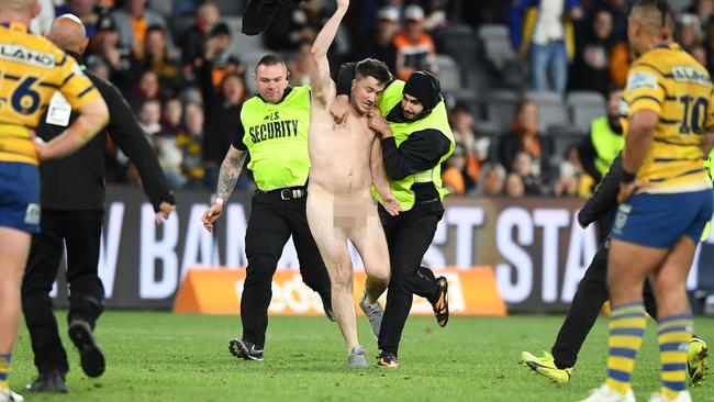 Matthew Cooper was a guest of the NRL before he invaded the pitch. Picture: AAP