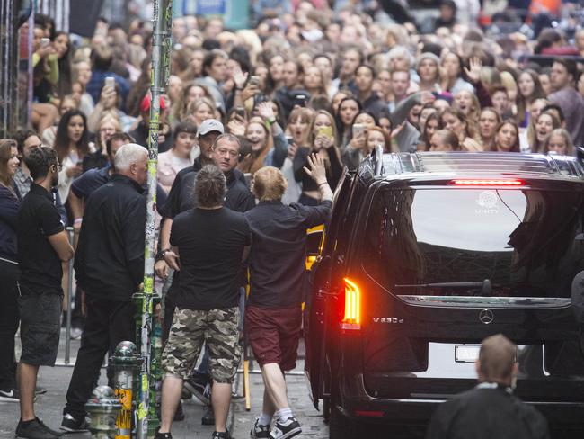 Ed Sheeran arrives at the surprise gig in Hosier Lane. Picture: Sarah Matray