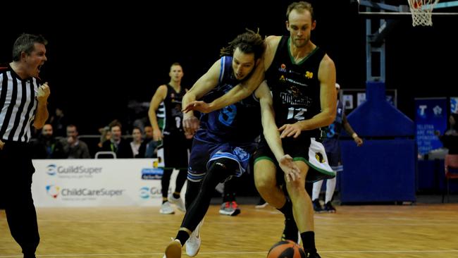 Hobart’s Craig Moller battles with Mount Gambier's Lewis Thomas this season. Picture: Fiona Harding.