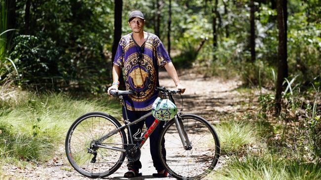 Bungalow resident Aidan MacGregor rides his bike through the Manunda bush tracks every week. Picture: Brendan Radke