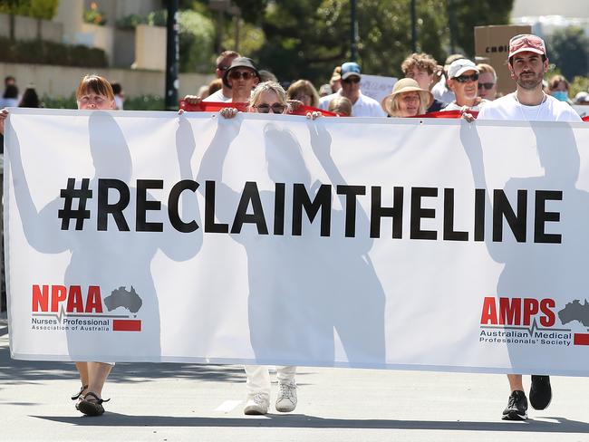 BRISBANE, AUSTRALIA - NewsWire Photos OCTOBER 1, 2021. Workers from multiple sectors  attend the #ReclaimTheLine protests. The #ReclaimTheLine protests oppose mandatory COVID Vaccines. Picture: NCA NewsWire / Jono Searle