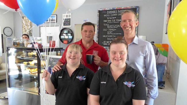 Compass Institute CEO David Dangerfield (back right) and Compass Connections Café employees Renee and Sophie. Picture: CONTRIBUTED