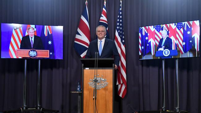 Boris Johnson, Scott Morrison and Joe Biden appear at a joint press conference in September to announce the AUKUS agreement. Picture: AAP