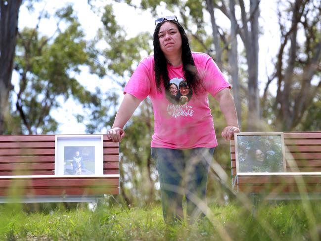 Angelina Kauffman is pictured standing at two memorial benches installed at the crash site by the local council. They each have a plaque with Ernesto and Alina’s name. Picture Jeff Darmanin