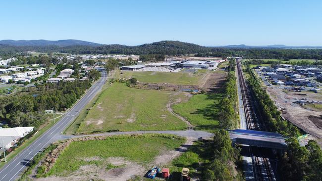 The block of land next to Pimpama City shopping centre which developer Norm Rix wants to put a train station on. Picture: Glenn Hampson.