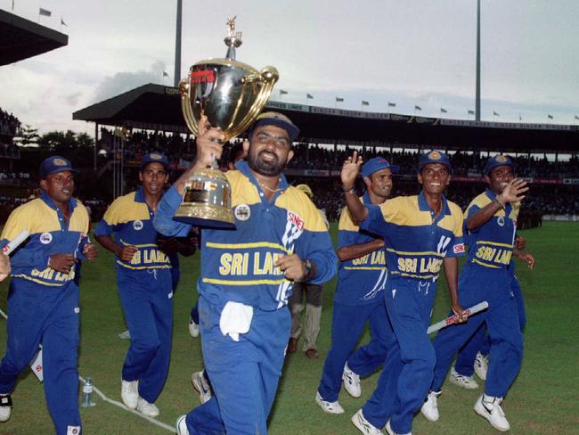 Asanka Gurusinha holds the World Cup trophy after Sri Lanka defeated Australia in the 1996 final in Colombo, Sri Lanka. Picture: Glenn Barnes